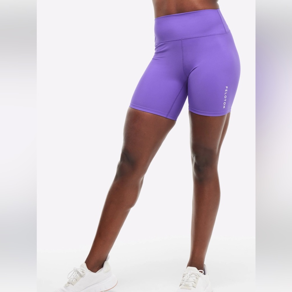 PELOTON APPAREL PURPLE SHOW UP BIKER SHORTS 7”